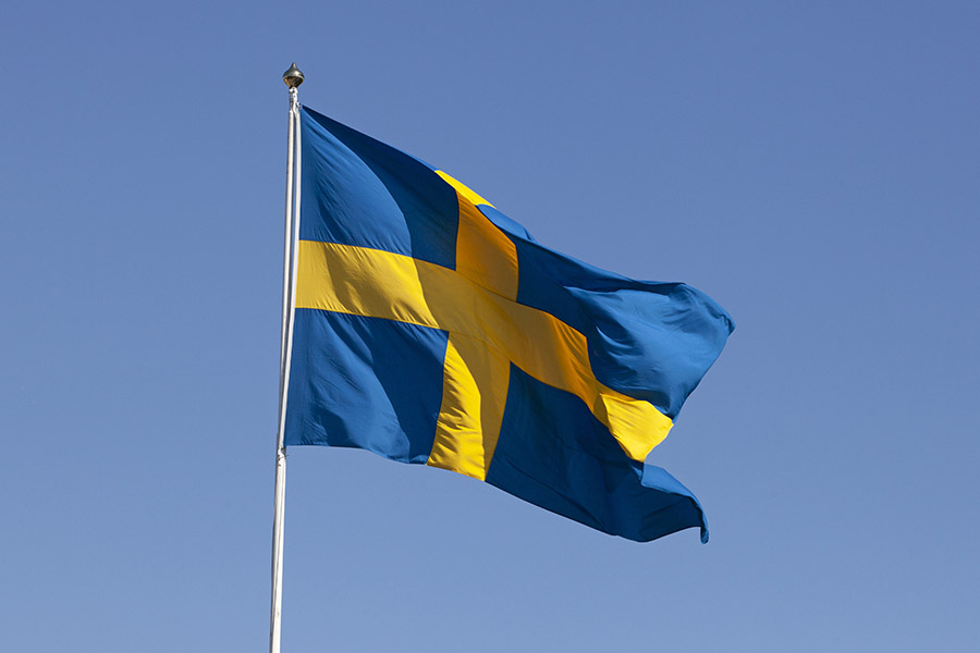 Klassiskt telegrammotiv med svensk flagga – hyllningsgåva från Läkare i Världen.